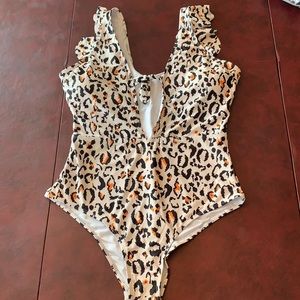 Leopard print, tie front, one piece swimsuit.